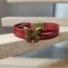 Bracelet en cuir avec papillon bronze (Coloris au choix)