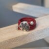 Bague femme cuir rond rouge et flocon argenté