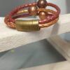 Bracelet femme en cuir rond tressé et ses trois perles cuivres