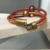 Bracelet femme en cuir rond tressé et ses trois perles cuivres