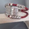 Bracelet cuir tressé rouge et passants argentés
