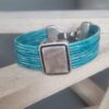 Bracelet cuir rond turquoise et son passant argenté