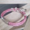 Bracelet cuir rond rose, perles et pendentif rond argentés