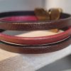 Bracelet femme en cuir et son fermoir papillon