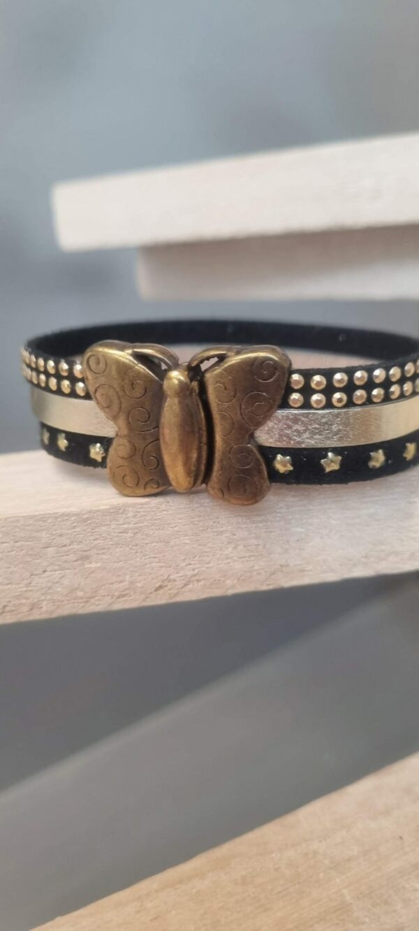 Bracelet femme en suédine noir et cuir doré, fermoir papillon