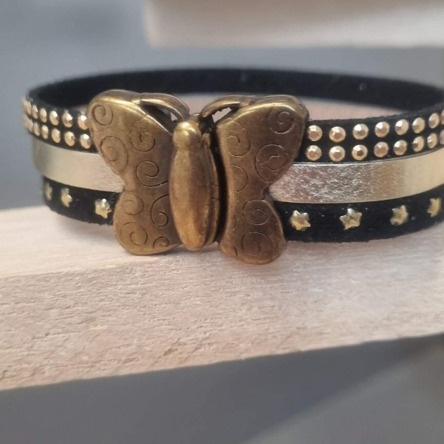 Bracelet femme en suédine noir et cuir doré, fermoir papillon