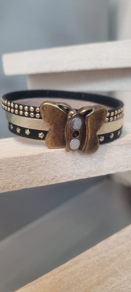 Bracelet femme en suédine noir et cuir doré, fermoir papillon