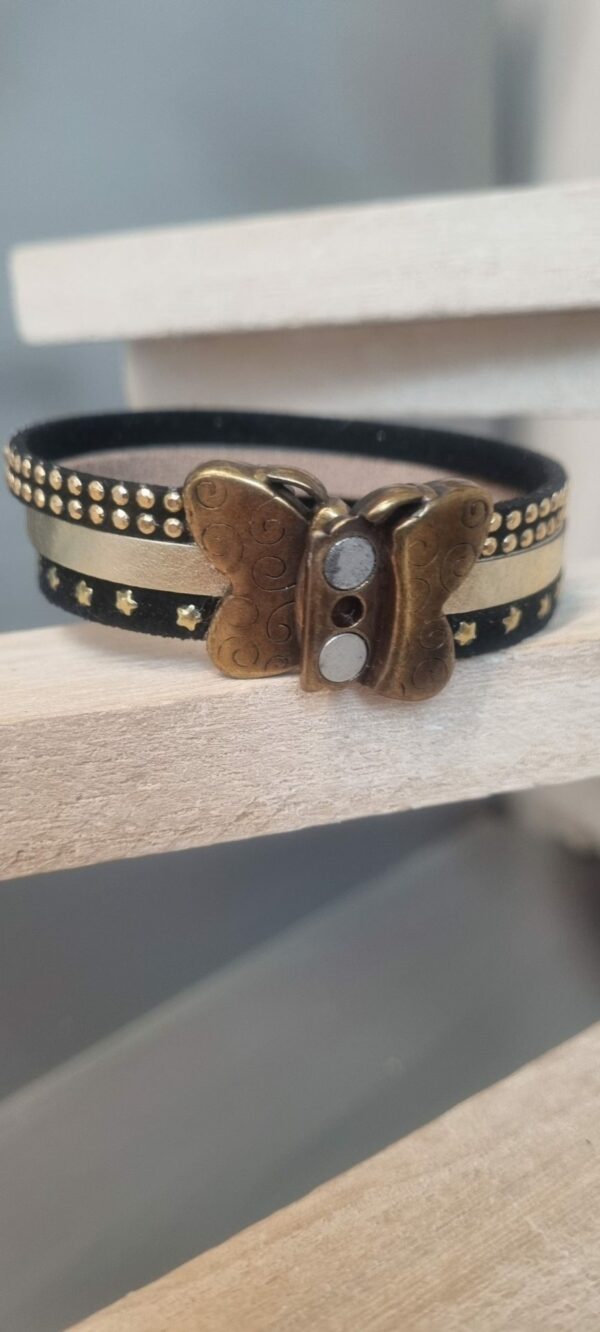 Bracelet femme en suédine noir et cuir doré, fermoir papillon