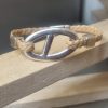 Bracelet femme cuir tressé doré et passant argenté