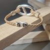 Bracelet femme cuir tressé doré et passant argenté