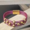 Bracelet femme cuir rond rose et ses perles dorées