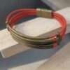 bracelet femme cuir rond orange, tubes et passants bronze