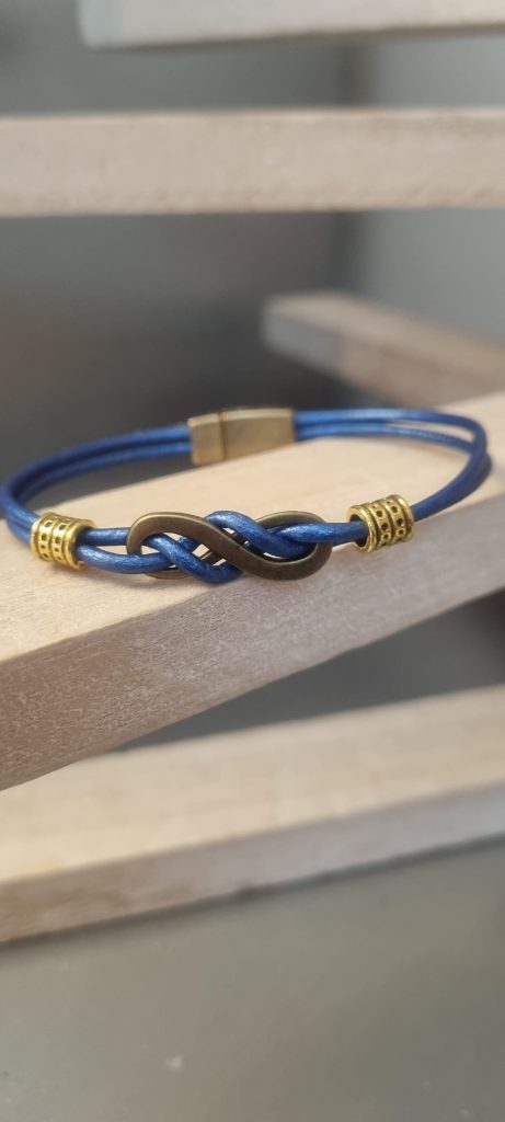 Bracelet femme cuir rond bleu et sigle infini bronze