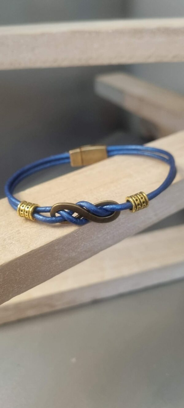 Bracelet femme cuir rond bleu et sigle infini bronze