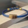 Bracelet femme cuir rond bleu et sigle infini bronze