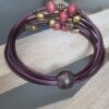 Bracelet femme en cuir rond violet et mauve, perles et tubes bronze et rose