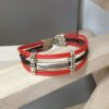 Bracelet femme cuir rond rouge et noir, passants argentés