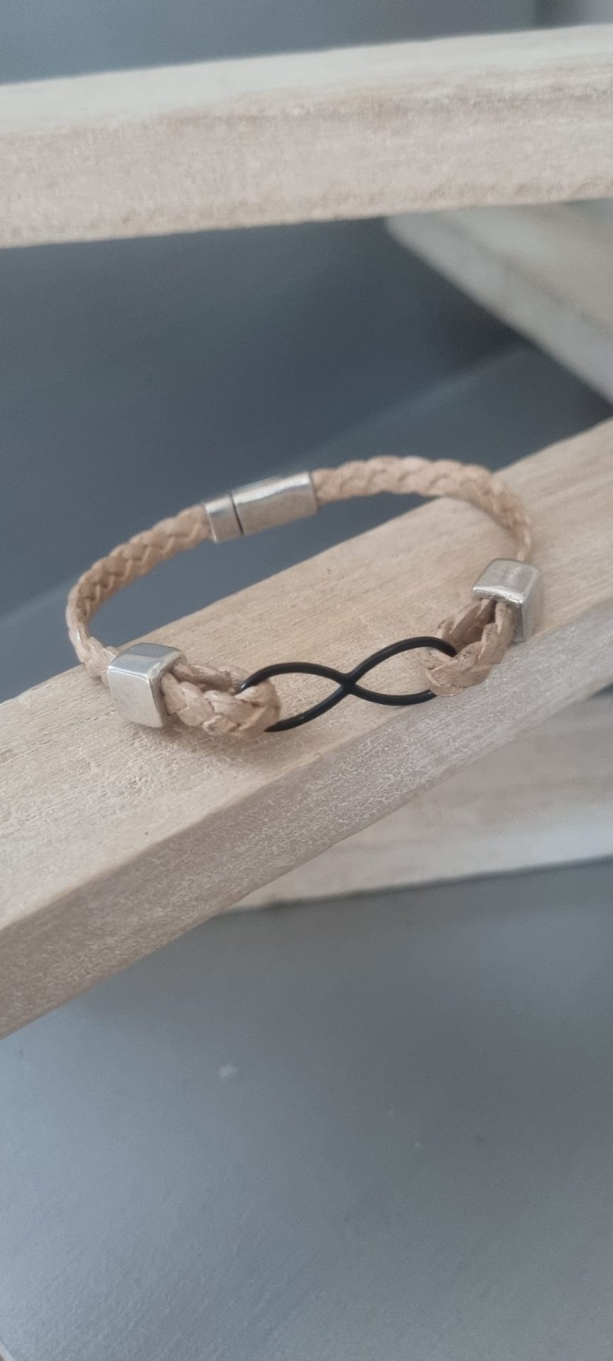 Bracelet mixte cuir tressé champagne et infini noir