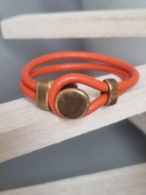 Bracelet mixte en cuir rond orange et fermoir bouton