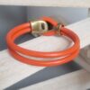 Bracelet mixte en cuir rond orange et fermoir bouton