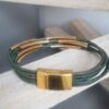 Bracelet femme en cuir rond 2mm vert et tubes dorés