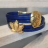 Bracelet femme double tour cuir bleu, passants ovale et fleur de lotus dorés