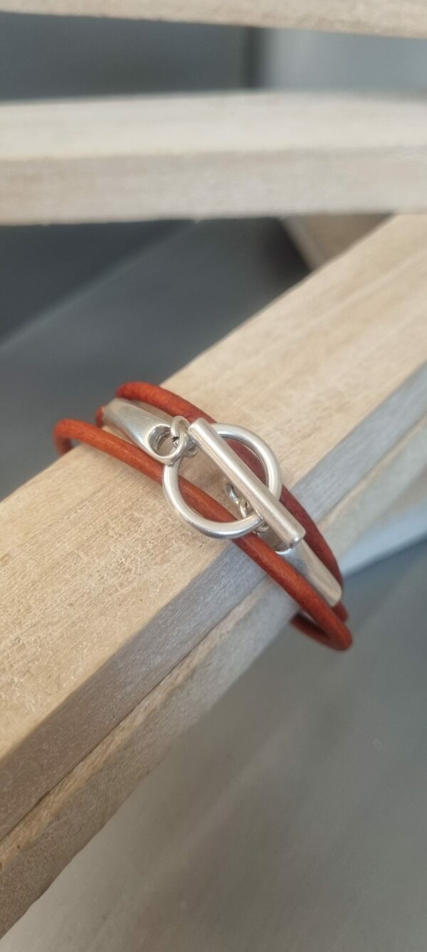 3CO27 - 20€ Bracelet femme triple tour cuir rond orange et fermoir T