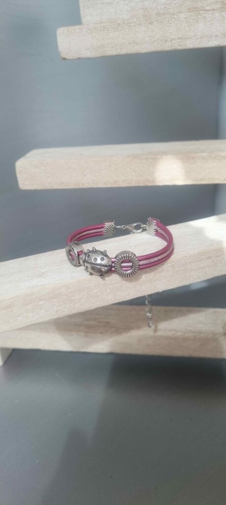 Bracelet femme enfant en cuir rond rose et sa coccinelle