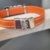 Bracelet femme en cuir orange et passant "LOVE"