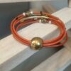 Bracelet femme en cuir rond orange et perles bronzes et argentées, tubes bronzes