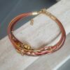 Bracelet femme en cuir rond fin ton mordoré et perles diverses