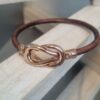 Bracelet mixte en cuir rond marron et fermoir infini