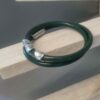 Bracelet mixte en cuir rond vert et osselets argentés