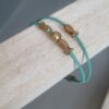 Bracelet enfant en cuir rond bleu et poissons dorés
