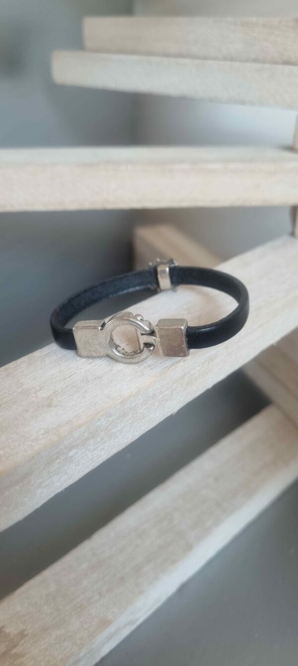 Bracelet enfant en cuir noir et coccinelle argentée