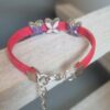 Bracelet enfant rose fluo et fleurs émaillées