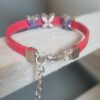 Bracelet enfant rose fluo et fleurs émaillées