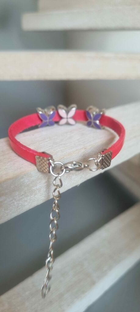 Bracelet enfant rose fluo et fleurs émaillées