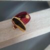 Bague femme en cuir rond rouge 2mm et passant ovale doré