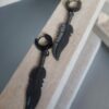 Boucles d'oreille plume noire