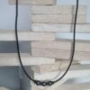 Collier homme cuir tressé marron, perles grises et noires