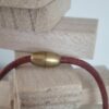 Collier femme en cuir rond vieux rouge, arbre et breloques dorés
