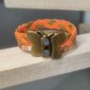 Bracelet enfant en cuir tressé orange et multi