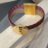 Bracelet femme en cuir doré et tressé rouge, pastille dorée