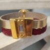 Bracelet femme en cuir doré et tressé rouge, pastille dorée