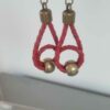Boucles d'oreille femme en cuir tressé rouge et sa perle bronze