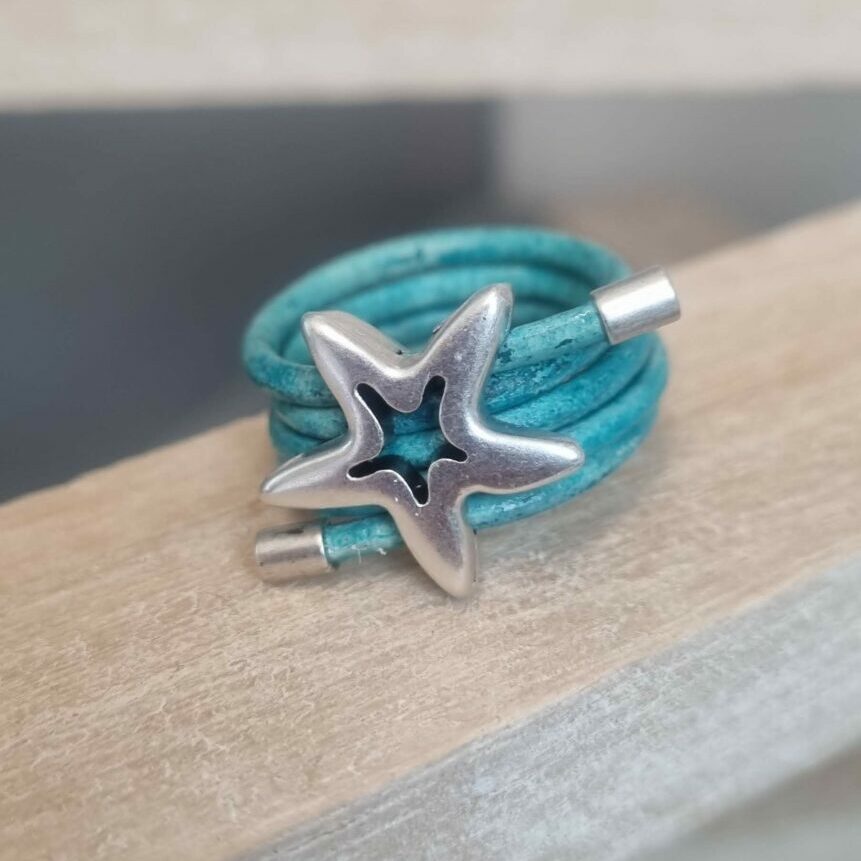 Bague femme en cuir rond bleu turquoise et son étoile argentée