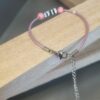 Bracelet enfant cuir rose et ourson