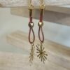 Boucle d'oreille femme en cuir rond marron bronze et son étincelle dorée