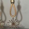 Boucle d'oreille femme en cuir rond bronze et son étincelle dorée